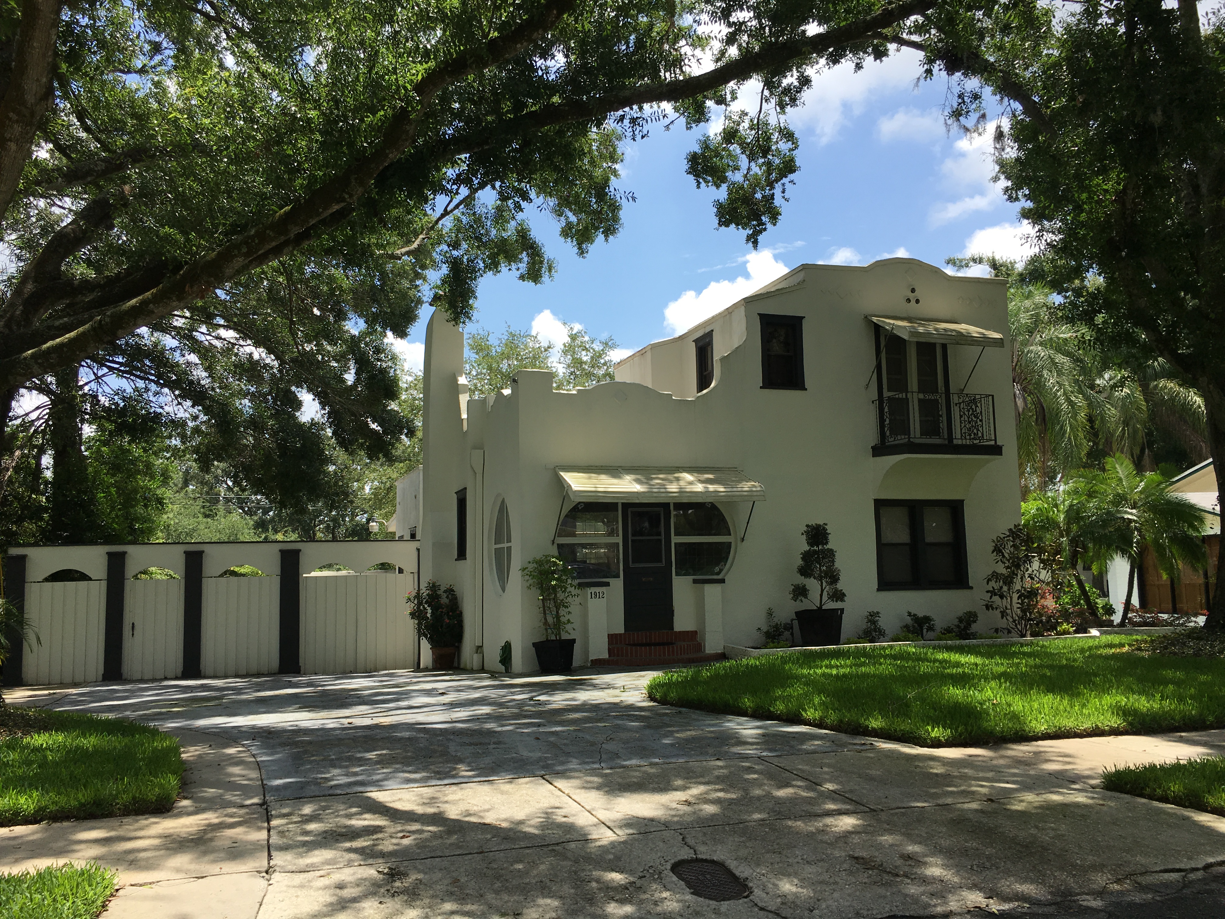 The neighborhood has a mix of one- and two-story residences, including this Spanish Colonial Revival home.