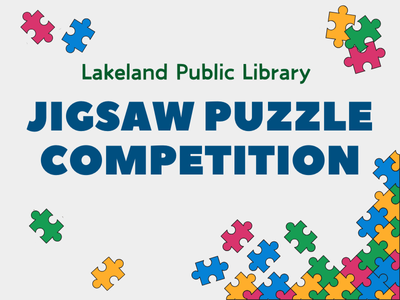 Blue, red, yellow, and green puzzle pieces scattered on white background with text Lakeland Public Library Jigsaw Puzzle Competition; link to Lakeland Libraries' event calendar