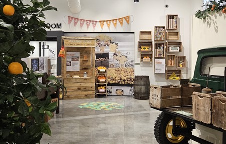 Lakeland History and Culture Center view of citrus stand and marketing citrus labels with History Room entrance on left