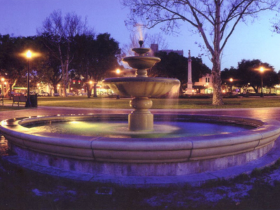 Munn Park Fountain in Lakeland, Florida after sunset; link to "Lakeland Parks and Recreation" contentDM collection