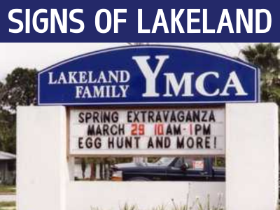 Business sign for the YMCA on Cleveland Heights Blvd and Westover St in 1996, advertising Spring Extravaganza egg hunt and more; link to History Pin "Signs of Lakeland" photo collection