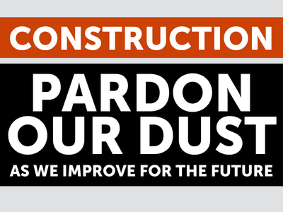 Grey, orange, and black sign with text Construction: Pardon our dust as we improve for the future; link to Jackson Branch Construction FAQs page