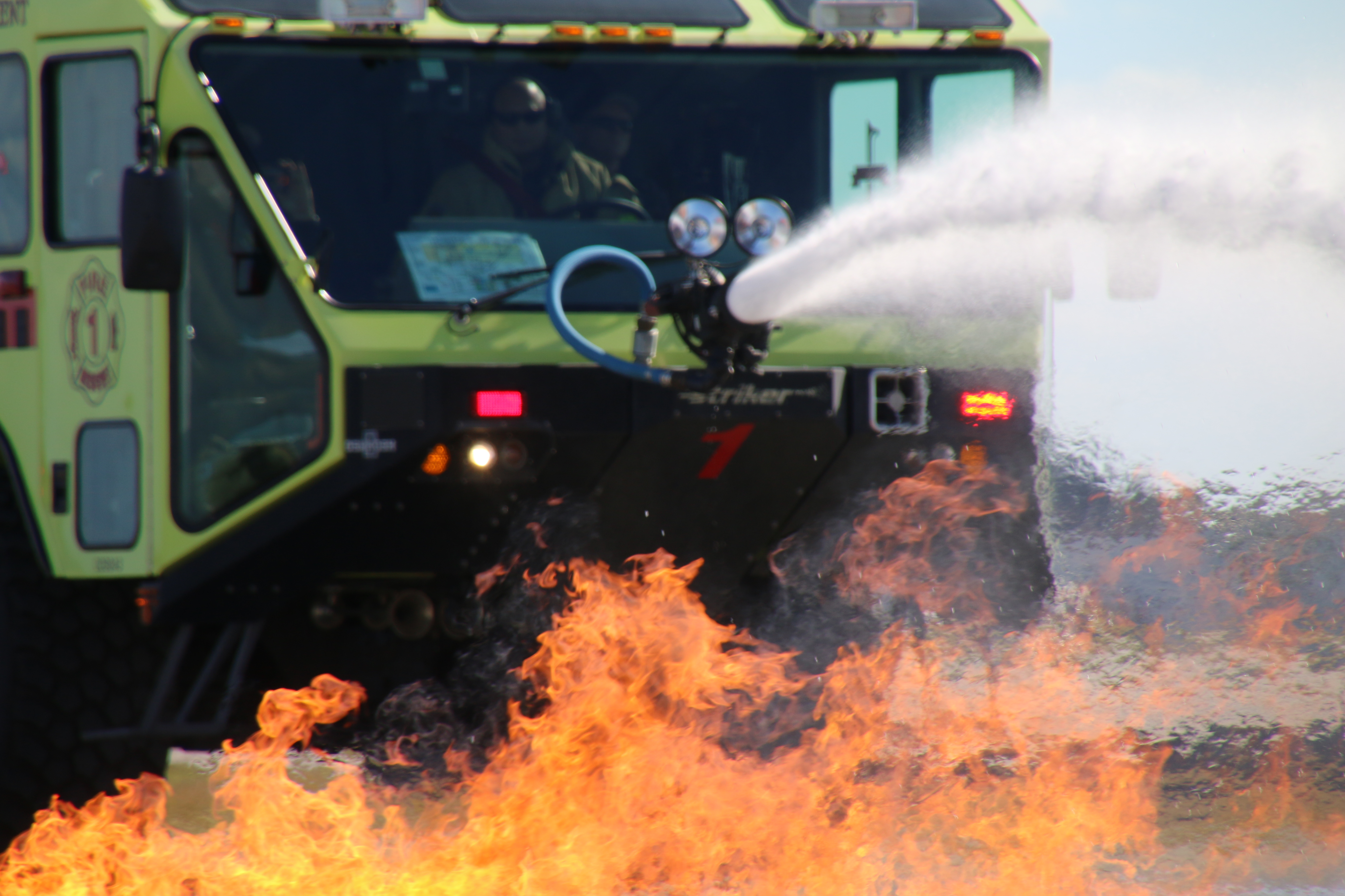 A picture of ARFF fire truck during live fire training at Lakeland Linder Regional Airport.