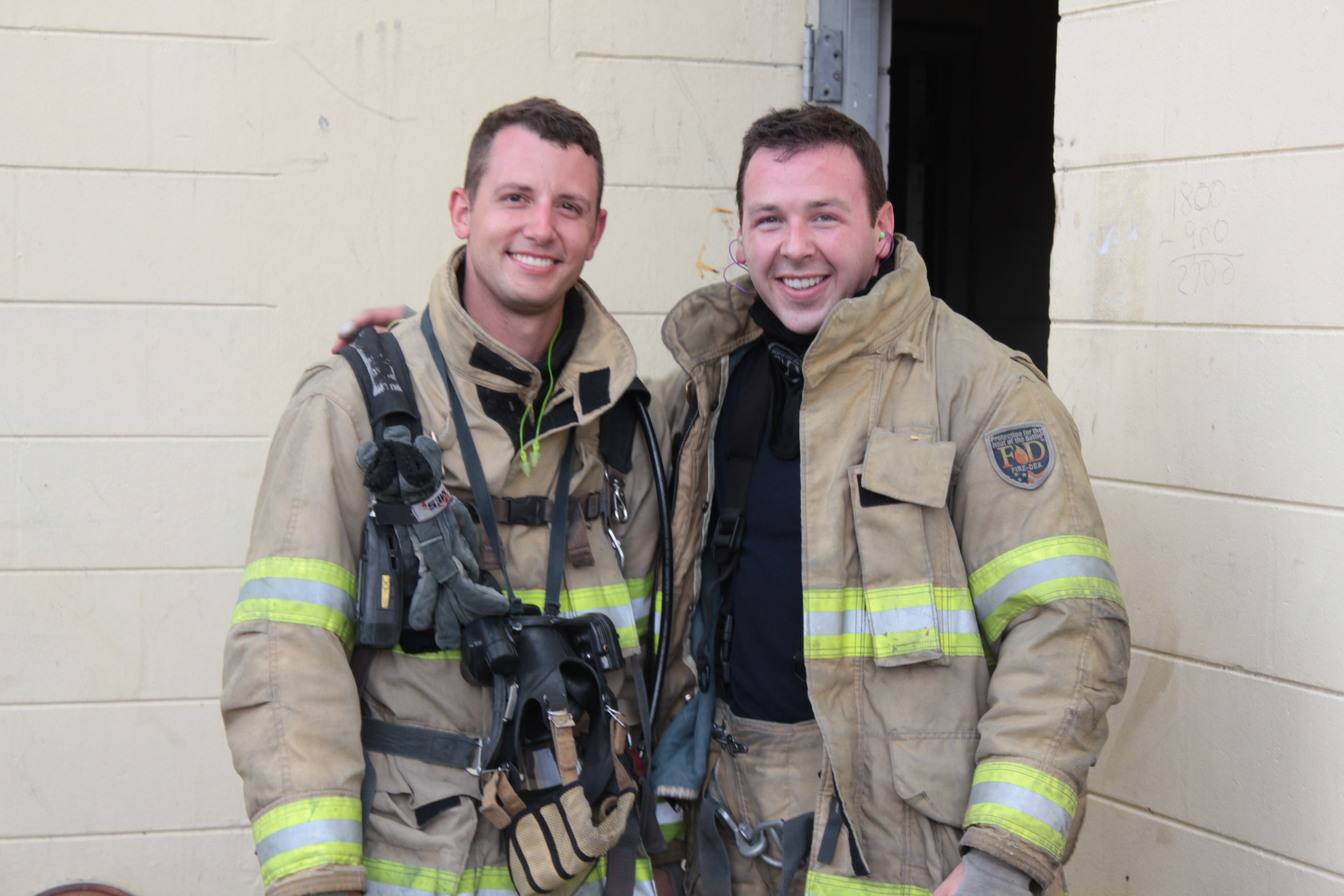 A picture of two firefighters