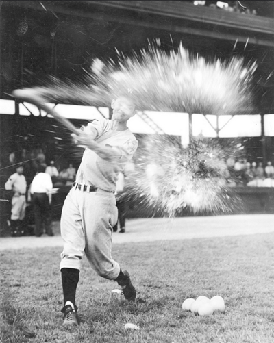 Unidentified ball player in Grapefruit League using a grapefruit for batting practice in 1941. The Grapefruit League consists of teams that practice in Florida for Spring Training; link to ...Ready to Play album